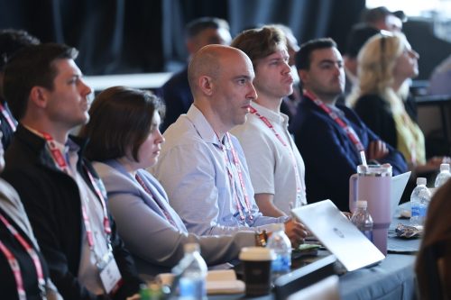 Attendees listen to tech talks at Horizon Summit 2025 presented by NetApp.