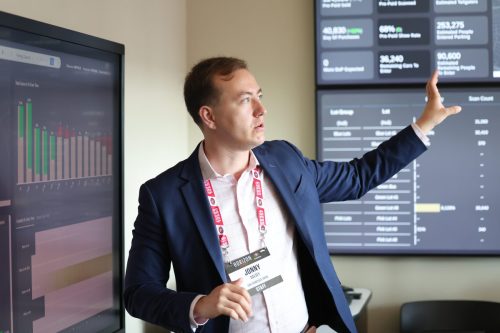 Jonny Dalsey shows guests the 49ers Executive Huddle presented by SAP.